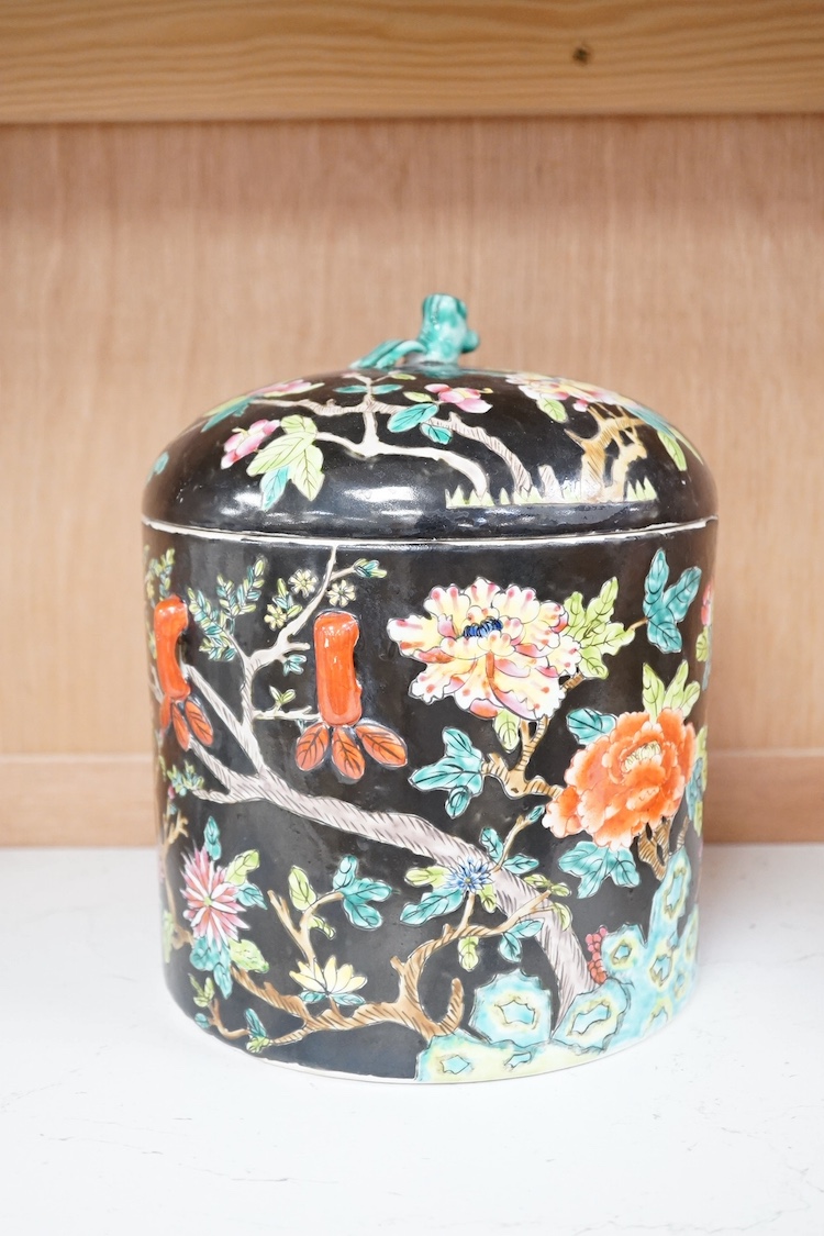 A Chinese famille noire jar and cover, 22cm. Condition - good